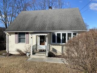 This photo shows the condition of the roof before the roof replacement. Paulito was unsure of the age of the roof, but with its aged and weathered shingles, it was time for a replacement.