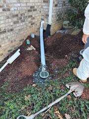 Exterior Drainage Line Installed for Proper Water Discharge