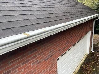 New gutters above garage