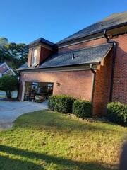 Side of home and garage