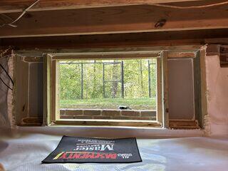 Reconstructed Crawl Space Entrance with Custom Door