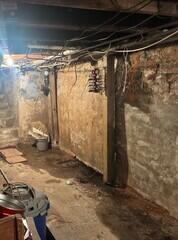 Sandstone Foundation = Leaky Basement!