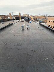 Setting up to remove layers of flat roofing