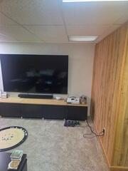TV Room Before: Cramped and Outdated