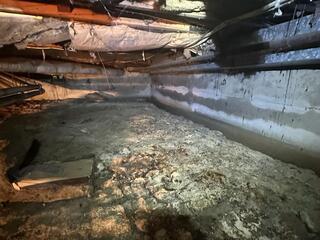 Water Stained Crawl Space Wall