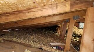The old insulation in this attic was falling apart. It was very thin and not insulating the space very well.
