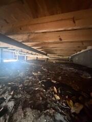 An inspection by the LRE Design Specialist revealed a lack of support for the home's floor joists, causing them to slope and sag.