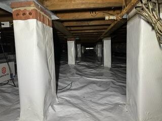 Wrapping the Piers to Prevent Condensation
