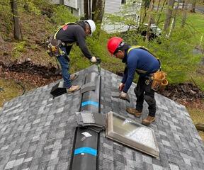 Ridge Cap Installation in Progress