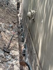 Excavation and Helical Pier Installation Underway