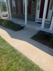 Lifting and Leveling a Sidewalk in Severn, MD