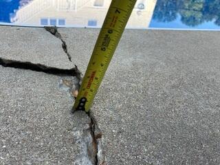 Cracked and Unleveled Sidewalk