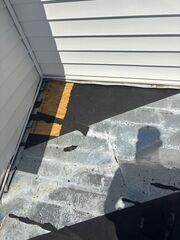 Checking the roofing for any weak or poor sealed sections.