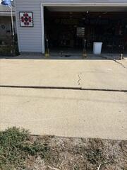 Unleveled and Cracked Driveway