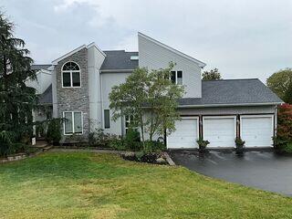 Notice the old siding and stone panel.
