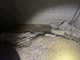Evidence of Standing Water on the Concrete Block Wall of the Crawl Space