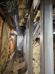 Holes are dug for the EverBrace wall posts
