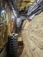 A crumbling foundation wall