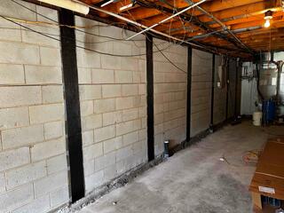 CarbonArmor Straps Installed to Stabilize a Bowing Foundation Wall