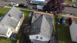 Roof Replacement Begins From Above