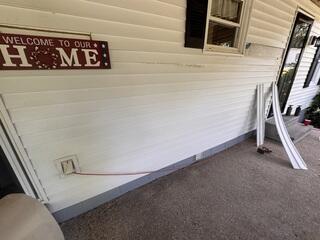Vinyl Exterior walls.