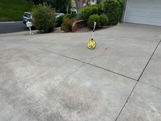Driveway Cracks Marked Before Concrete Repair