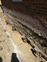 Helical Piers Added to Bottom of The Foundation