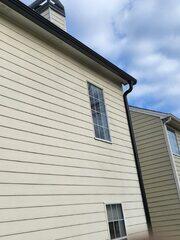 New black Gutter Shutter downspouts