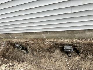 Foundation Lifted and Stabilized with Piers