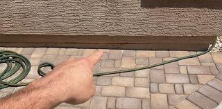 Close-Up View of Stem Wall Rust and Concrete Deterioration