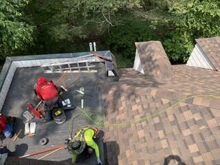 Detail Work Around Flat Roof Tie-Ins