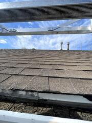 Once on the roof, we see the extent of the storm damage, which has caused the fascia to need replacement and the need for a new gutter system.