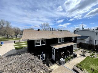 A drone captured an aerial photo to show Renee the damage to the roof. From this perspective, the wear and tear is clearly visible. The general guideline is that if more than 25% of the roof requires repairs, it will qualify for a complete replacement.