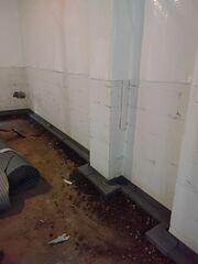 Photo 4: Interior Drainage System Gets Installed