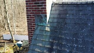 Moss and Staining Around the Chimney