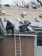 Careful Shingle Installation by Hand