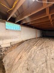 Damp and Dirty Crawl Space