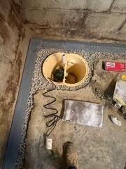 Once the WaterGuard is place the sump pump container is installed. The parts are assembled into the already placed container of the sump pump.