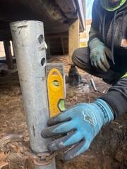 Helical Piers Driven into Soil