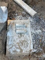 Helical Pier Porch Brackets in Footing