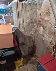 Water seepage had been slowly getting through the walls and floors of Kim's basement! Check out the dark discoloration her walls and floors had started to develop, along with the constant wet spots she had been dealing with for far too long.