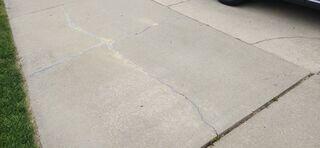 Cracked and Uneven Concrete Driveway