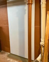 Plugged and Patched Basement Wall