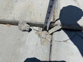 Concrete Settlement Creating Trip Hazard Near Expansion Joint