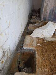 Push Pier Installation Beneath the Foundation