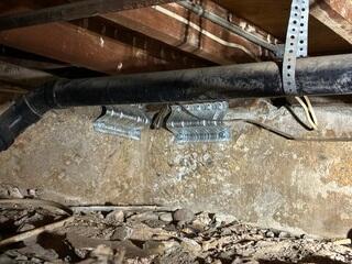 Engineered Seismic Brackets Installed Along Foundation Wall
