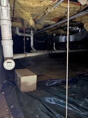 As you can see, the crawl space was in disarray. The fiberglass insulation was old & rotted, there was moisture buildup on the ground, and there was debris scattered throughout the area.