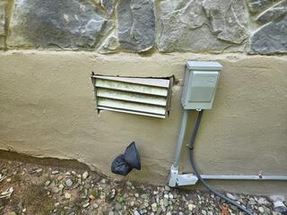 During our inspection, we located several access points in and around the home. Several of which were loose and damaged crawl space vents.