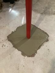 Lally Column Cemented into Foundation Floor