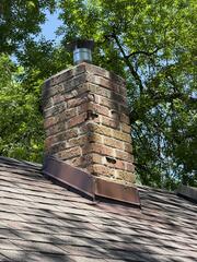 Chimney has damaged bricks